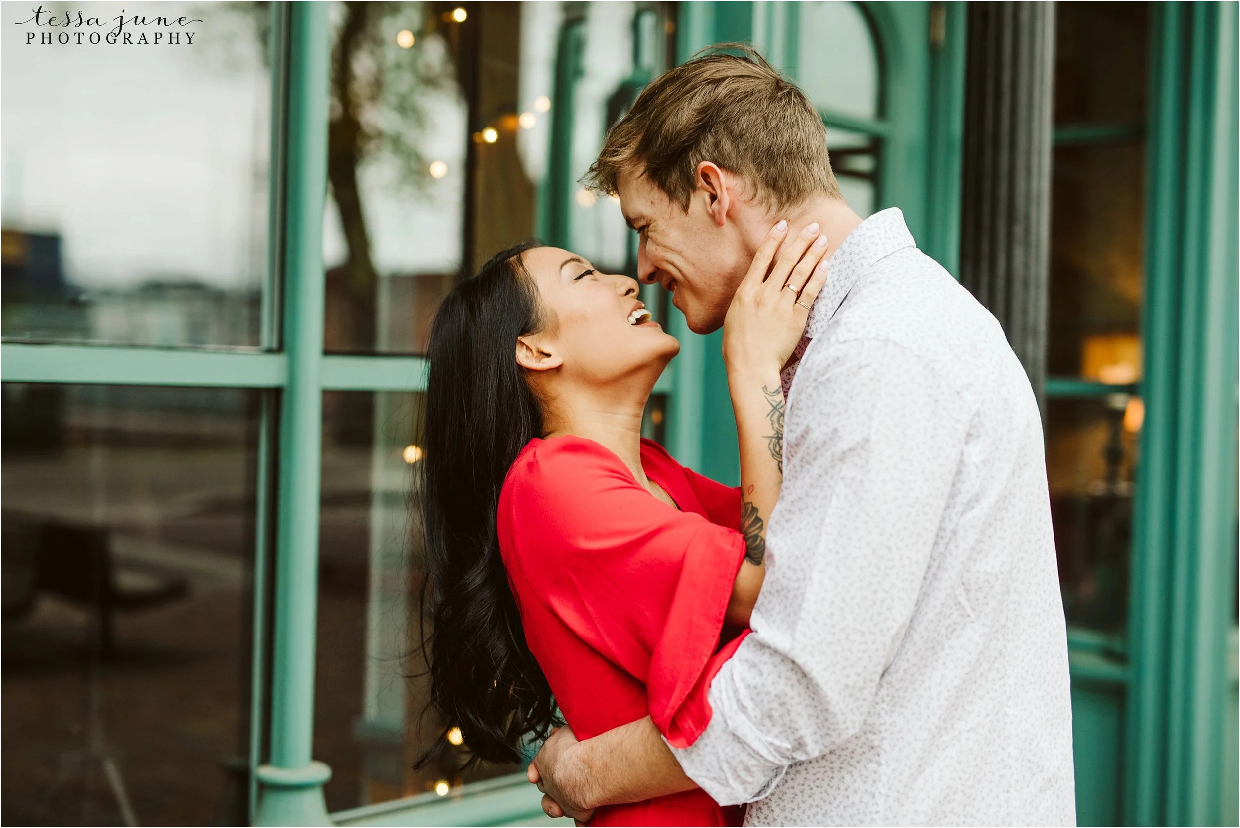 st-anthony-main-minneapolis-engagement-session-red-dress-16.jpg