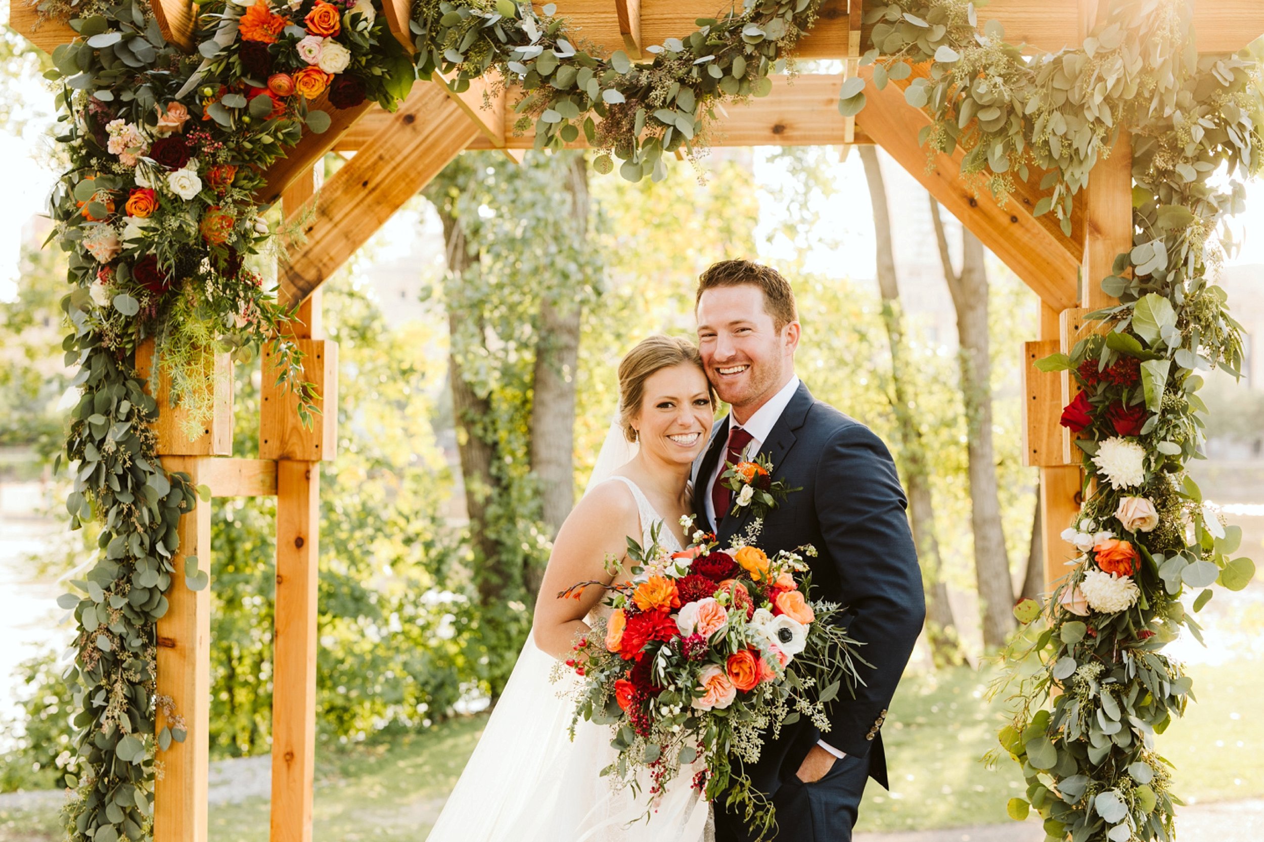 Nicollet-Island-Pavilion-Minneapolis-September-Coral-Navy-Wedding-62.jpg