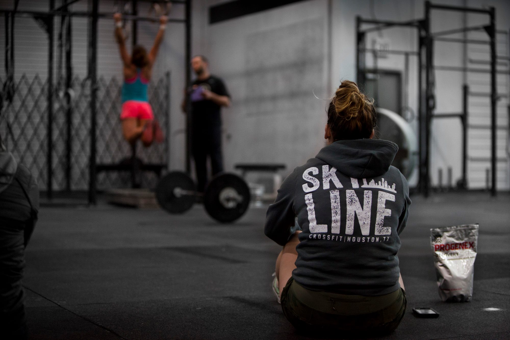 Brandy watching Brittany crush pull-ups, while preggo.