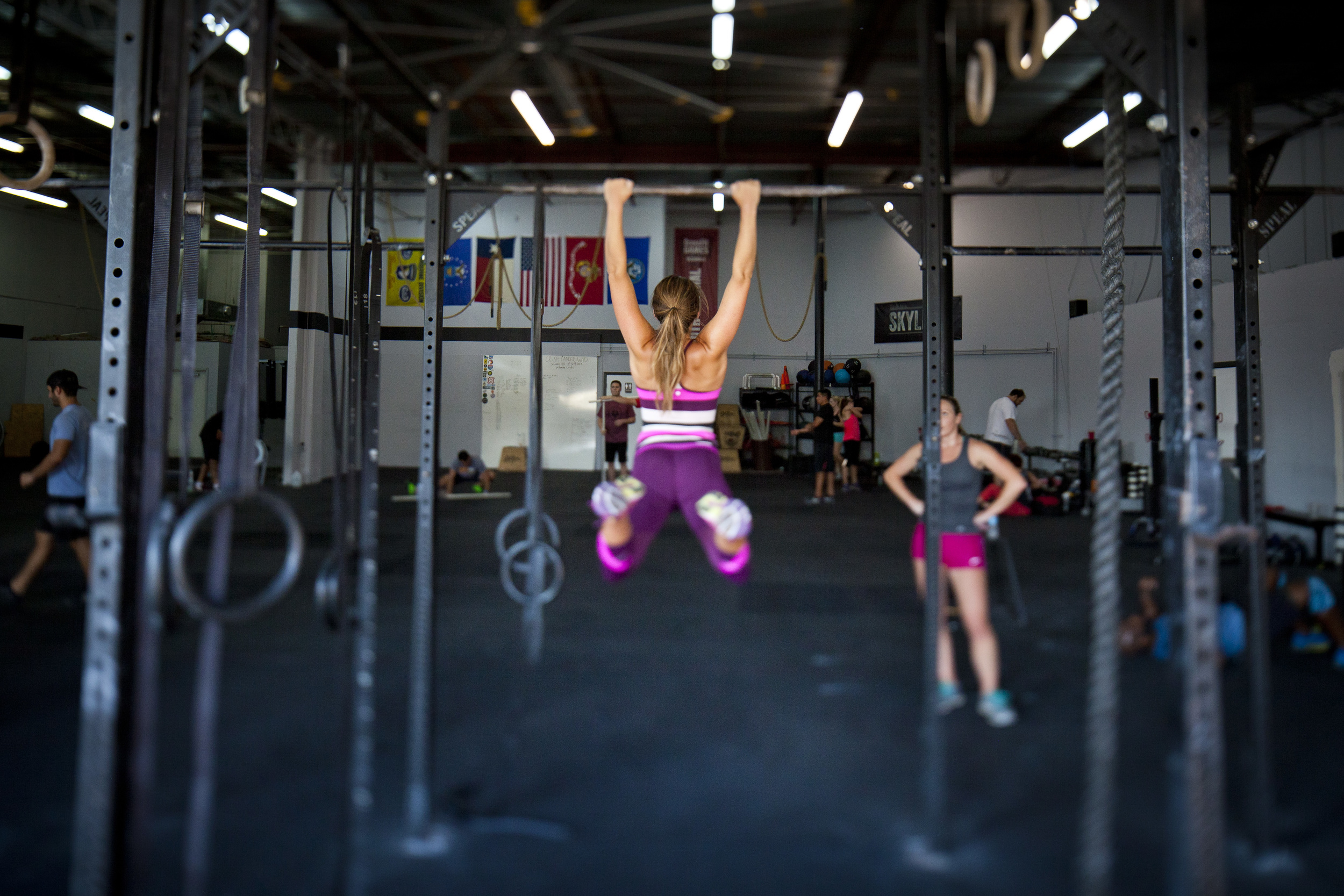 Macy and Kari knocking out some pull-ups.