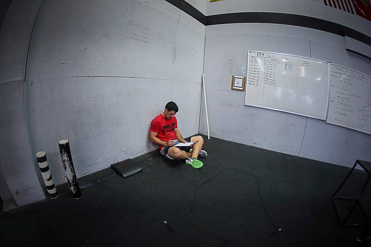 Todd finishing up his homework before the workout.
