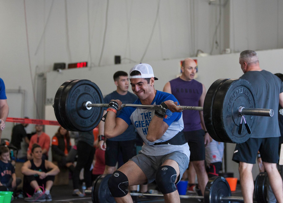 Firefighter and Skyline Member Alex Lopez going for a 5 -rep front squat.