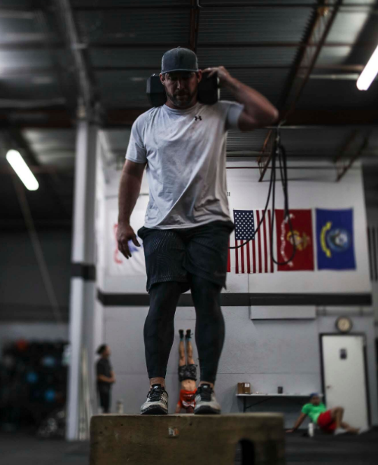 Long time member and Birthday boy Trey Helle making light work of DB step ups!