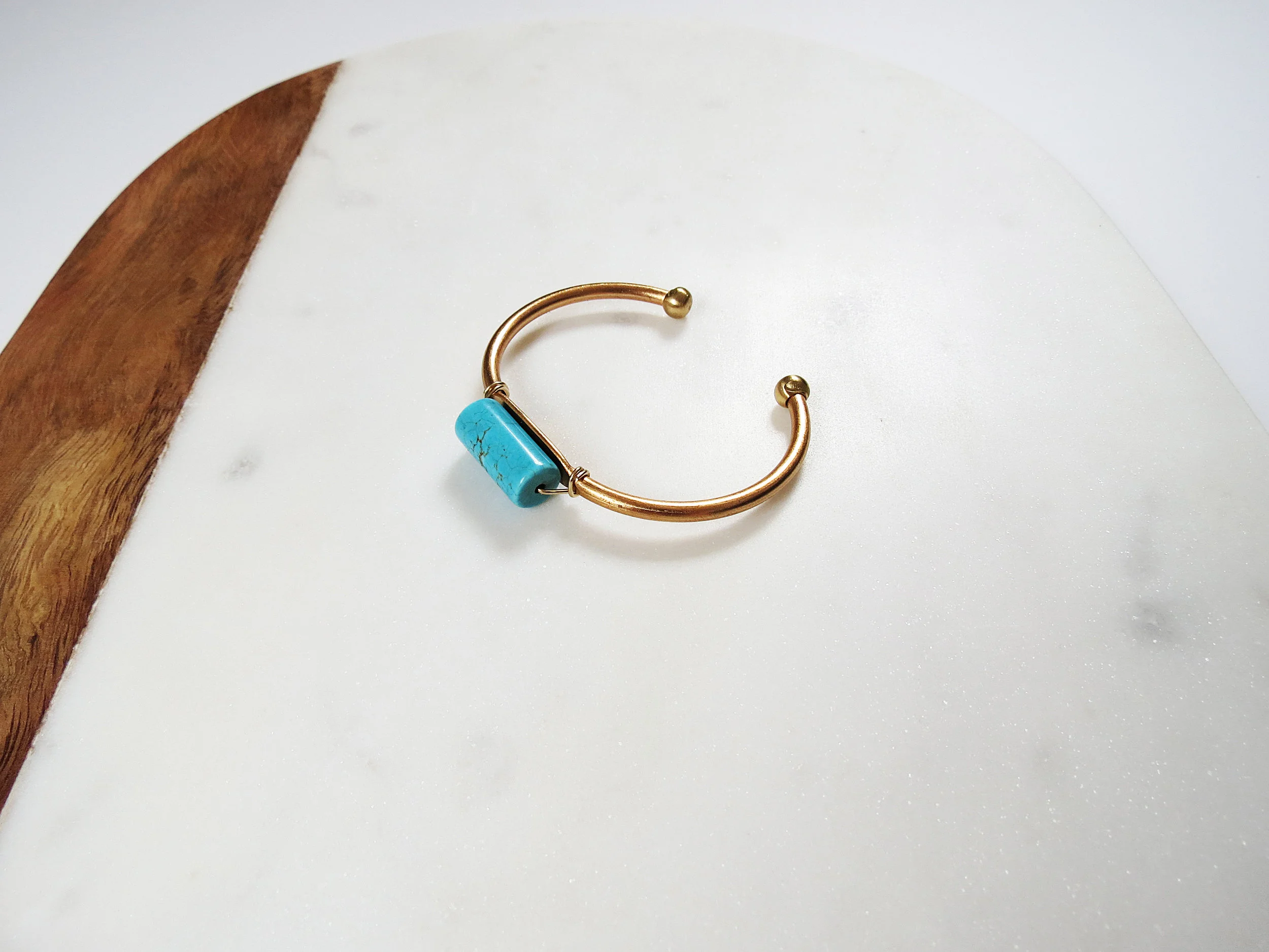 Turq Roll minimal modern handmade jewelry gold raw brass, gold-filled wire + turquoise magnesite cuff bracelet detail