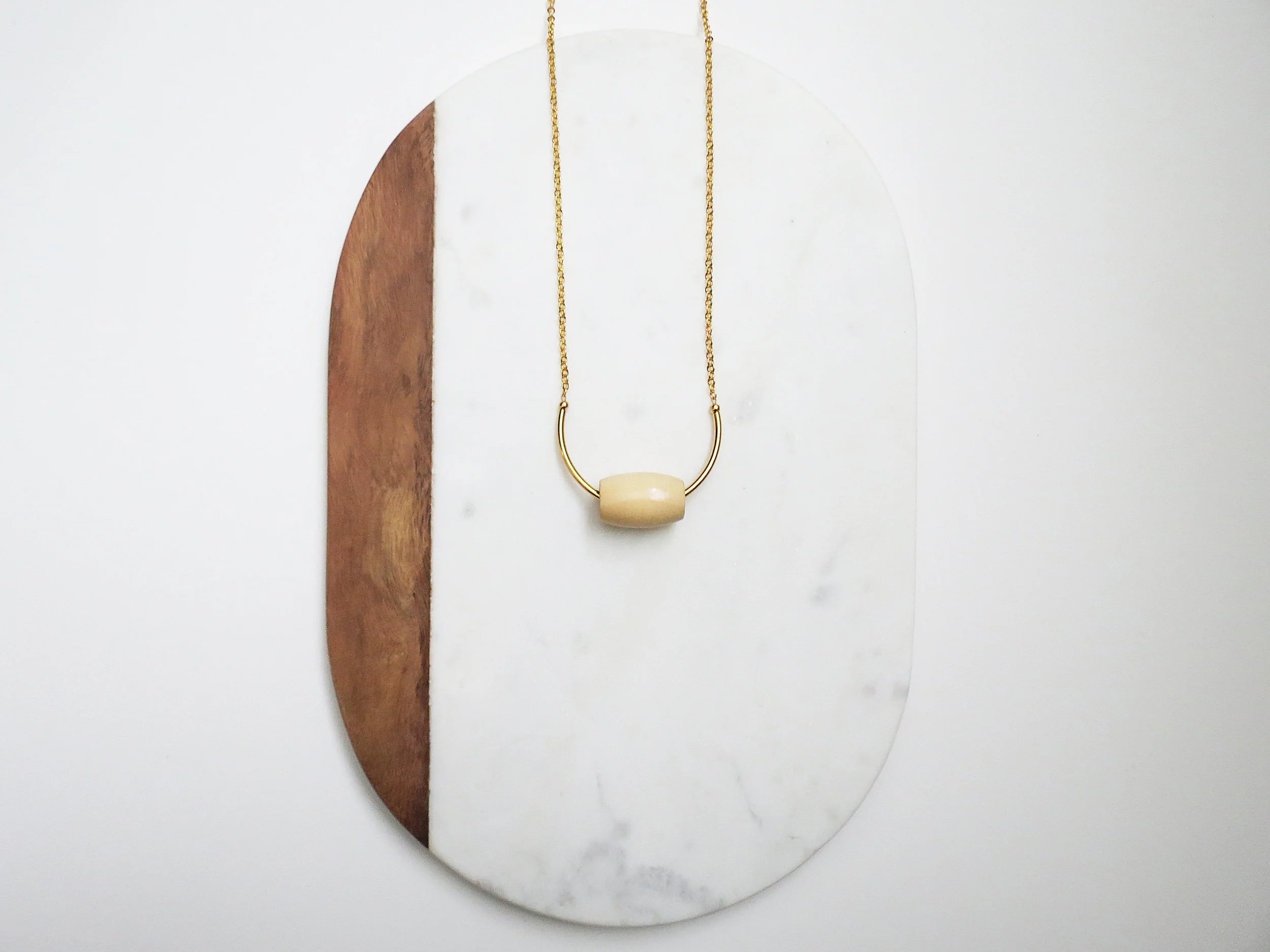 Untitled I minimal modern handmade jewelry gold plated brass tube + white creme wood bead long statement necklace