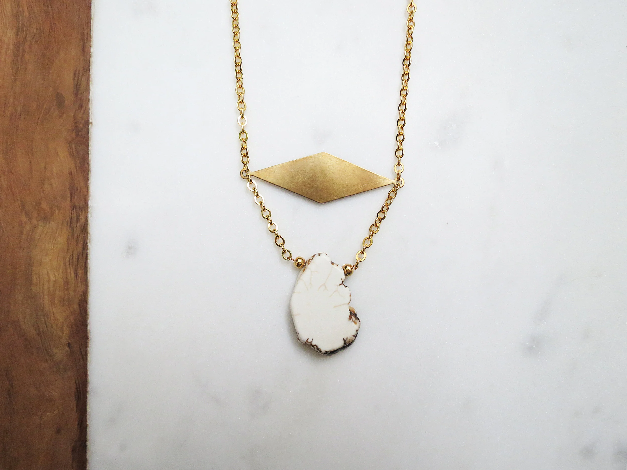 Artemis minimal modern handmade jewelry gold raw brass diamond + white magnesite statement necklace detail