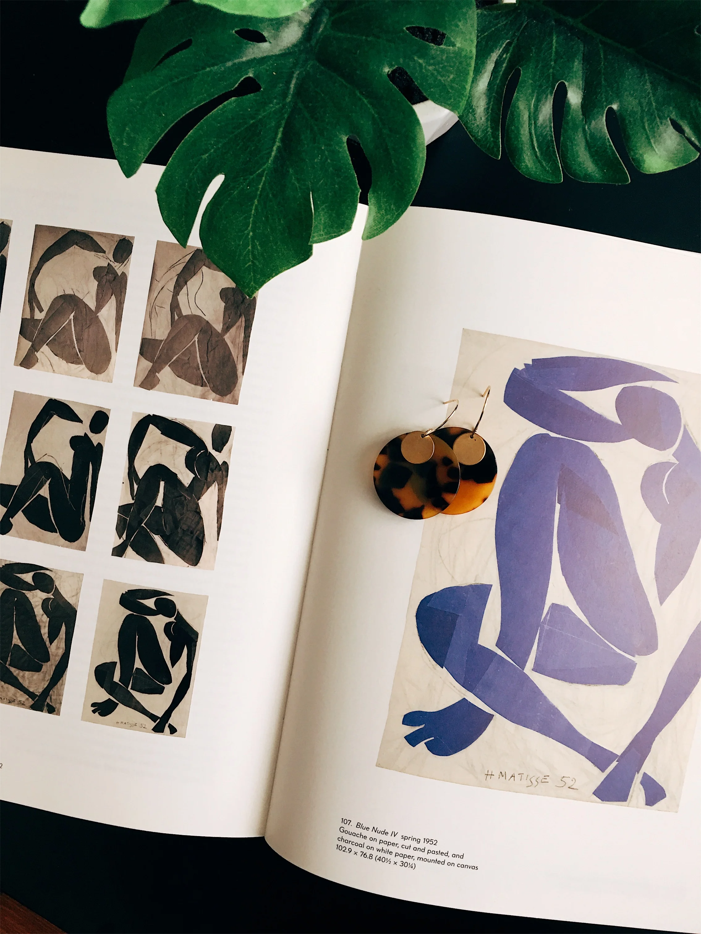 Rowan minimal modern handmade jewelry gold raw brass, gold filled-wire + tortoiseshell round earrings styled on Henri Matisse art book