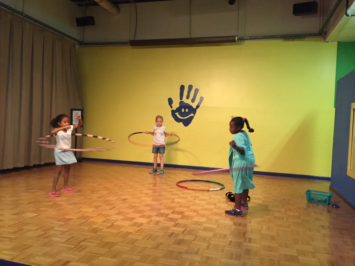 All dressed up and hula hooping at Hands On!