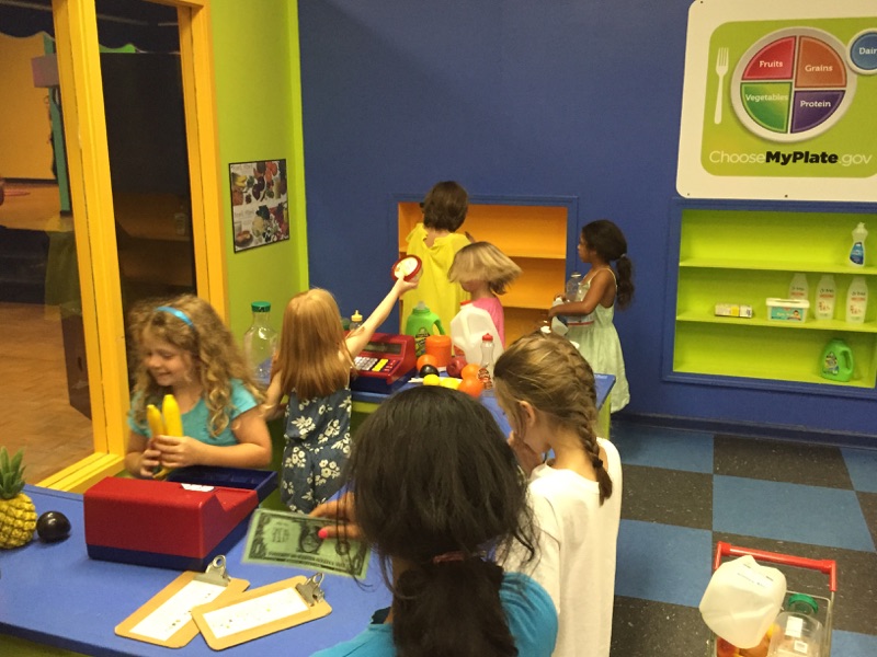 The girls loved the grocery store at Hands On!