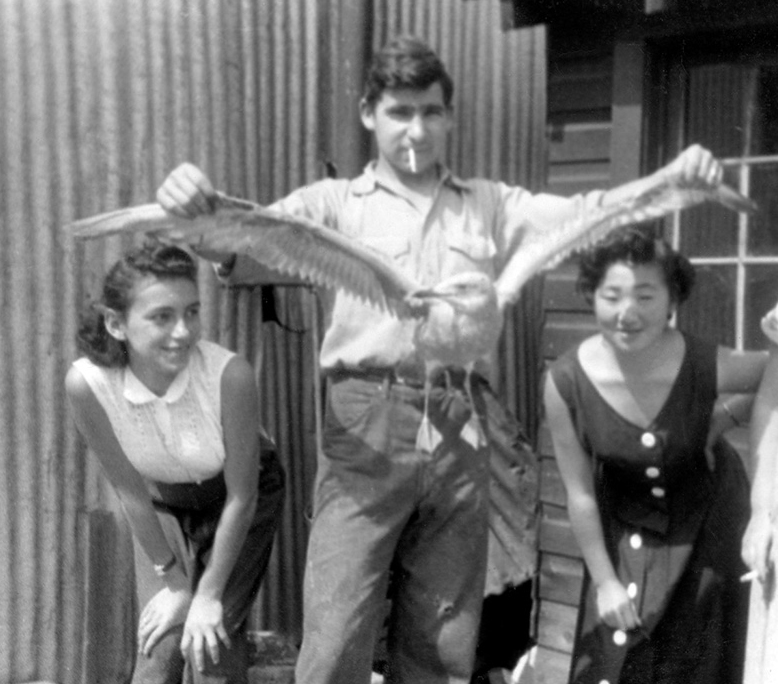 Seagulls were a constant at the Ojibway. They were attracted by the ongoing fish-cleaning operations. When, in the summer of 1954, an errant gull found its way into the laundry one afternoon, 17-year-old Emmaline (left) was in on the fun.