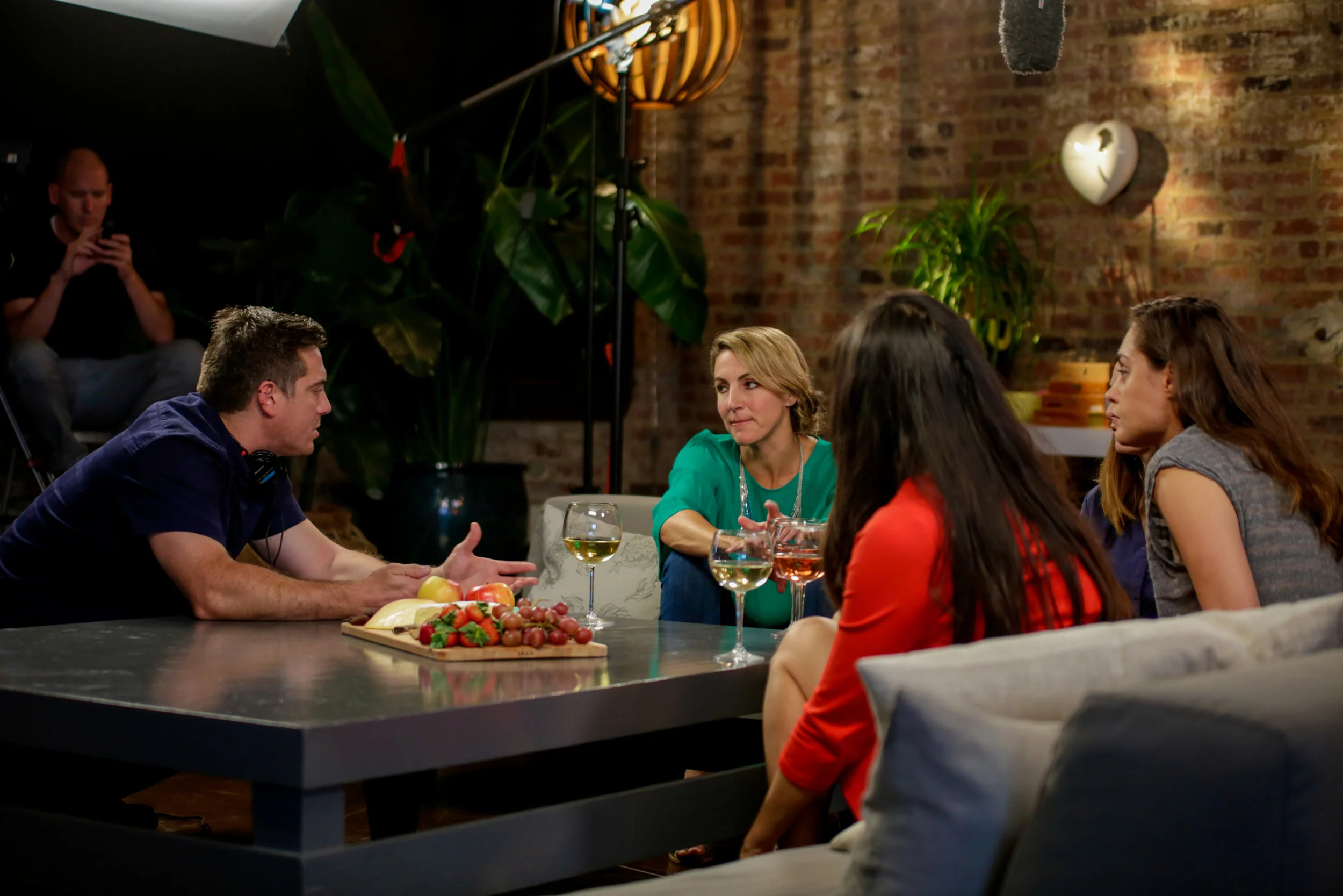 Director Jon Johnnidis on set during Mom's Night Out with host Summer Sanders and mom guests Julie Kottakis, Michelle Won and Katie Cariello