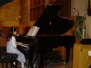Alyssa and Piano.jpg