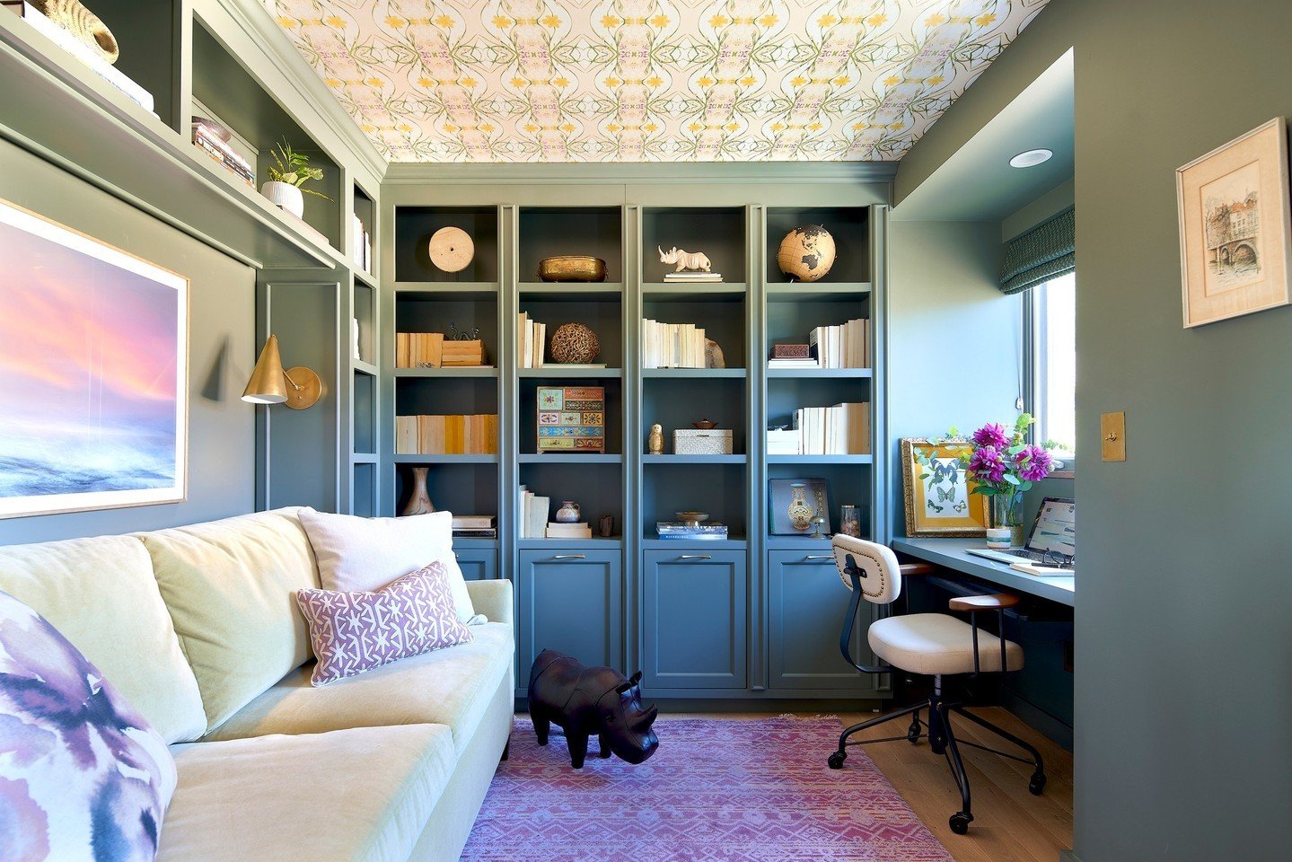 The white-box-with-a-closet turned library-guest room-office-and quiet reading room transformation.