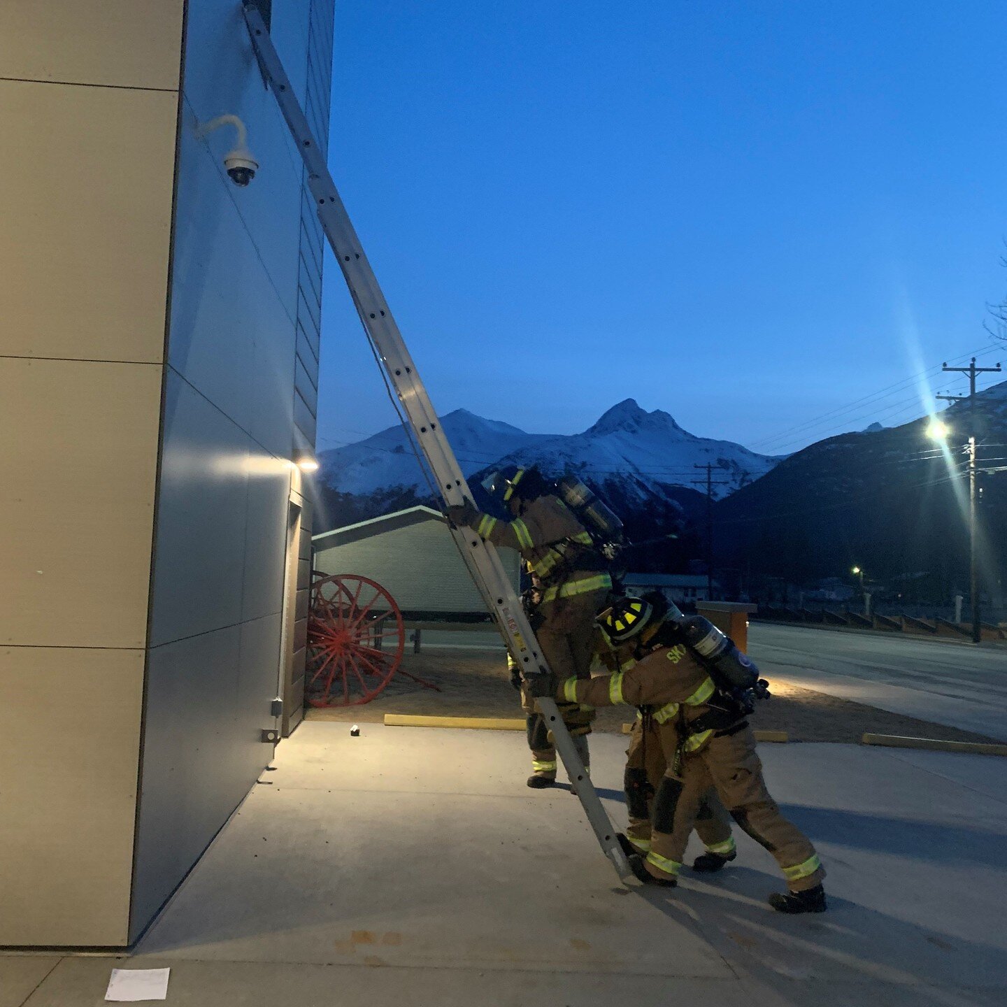 &quot;There is nothing impossible to they who will try.&quot; ~Alexander the Great

Skagway, Alaska Firefighter crews working on ladder skills at 2130, with a gorgeous view in the background. 

#firefighter1 #firetraining #fireservice #truckops #ladd