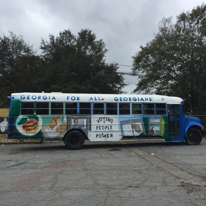 Hope for Georgia Bus — Right side wide viewIn response to voter machine concerns, and voter suppression tactics, Living Melody Collective drew inspiration from the history of voting rights and trace the changes in the voting systems through history …