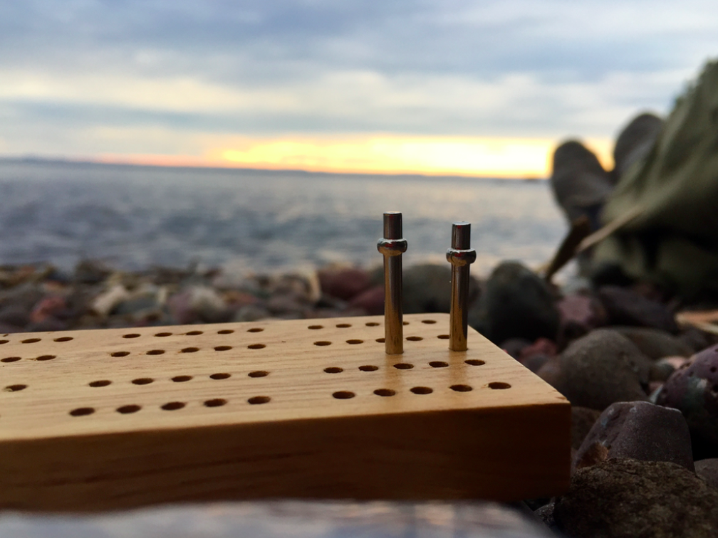 Sunset at Huginnin Cove over cribbage 