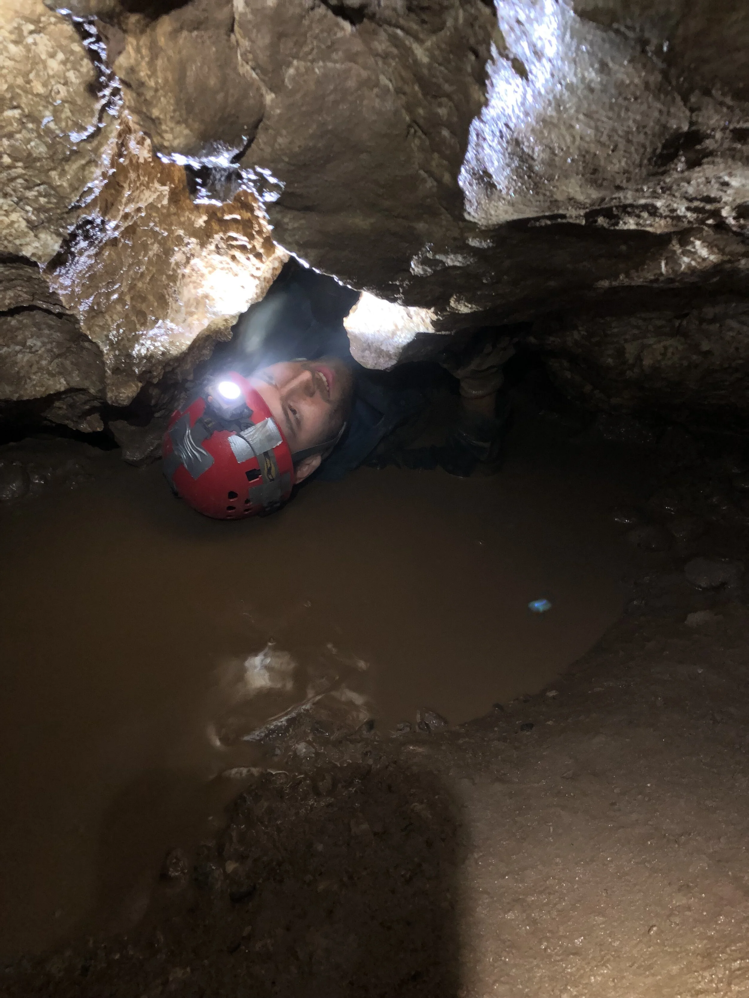 Cameron de Wet caving in California.