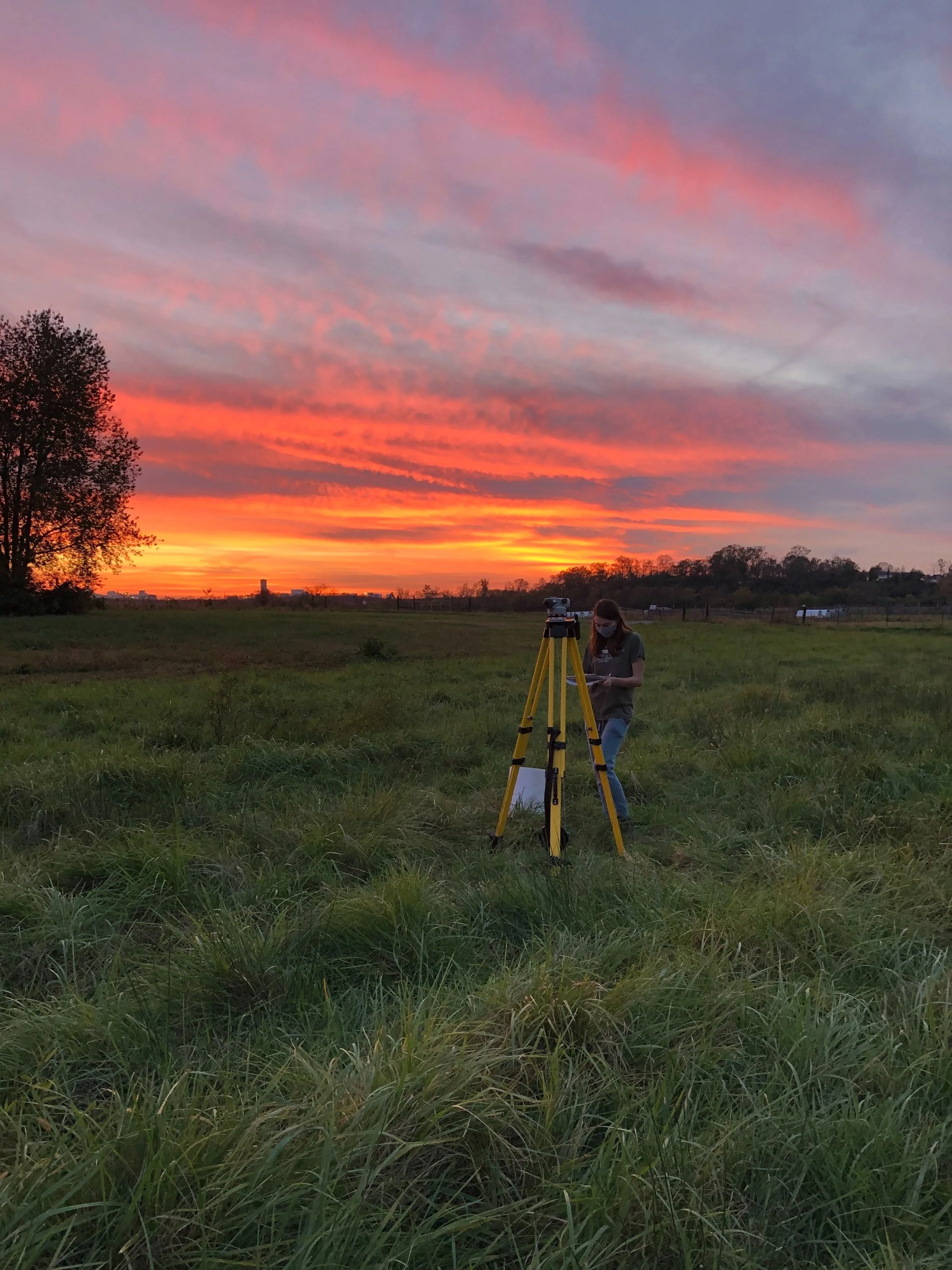 Senior honor’s student Hannah Quick (VU Class of 2021) measures an elevation profile for a transect of well sites on the Tennessee State University Research Farm.