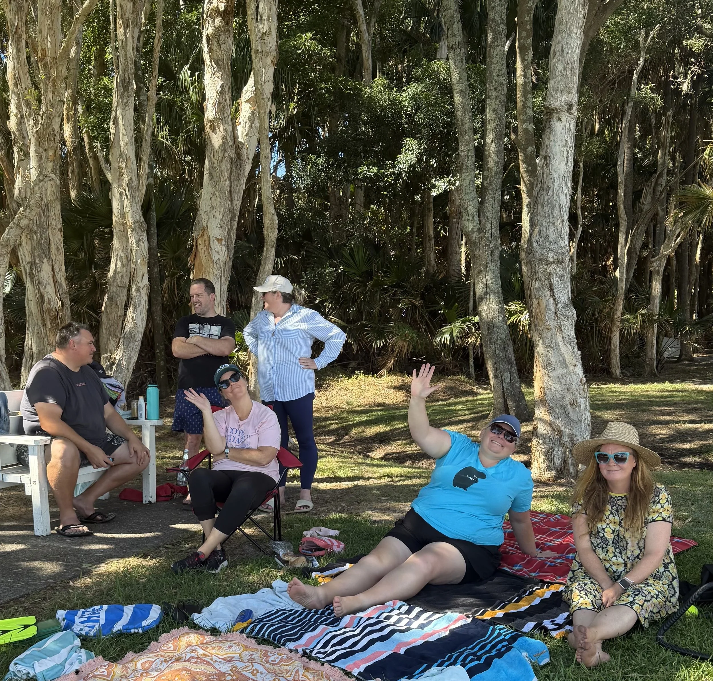  Relaxing by the lake watching the paddle boarding 