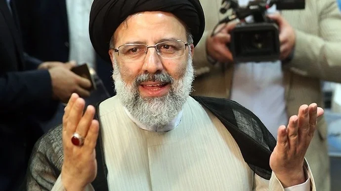 Ebrahim_Raisi_registering_at_the_2017_Iranian_presidential_election_07.jpg