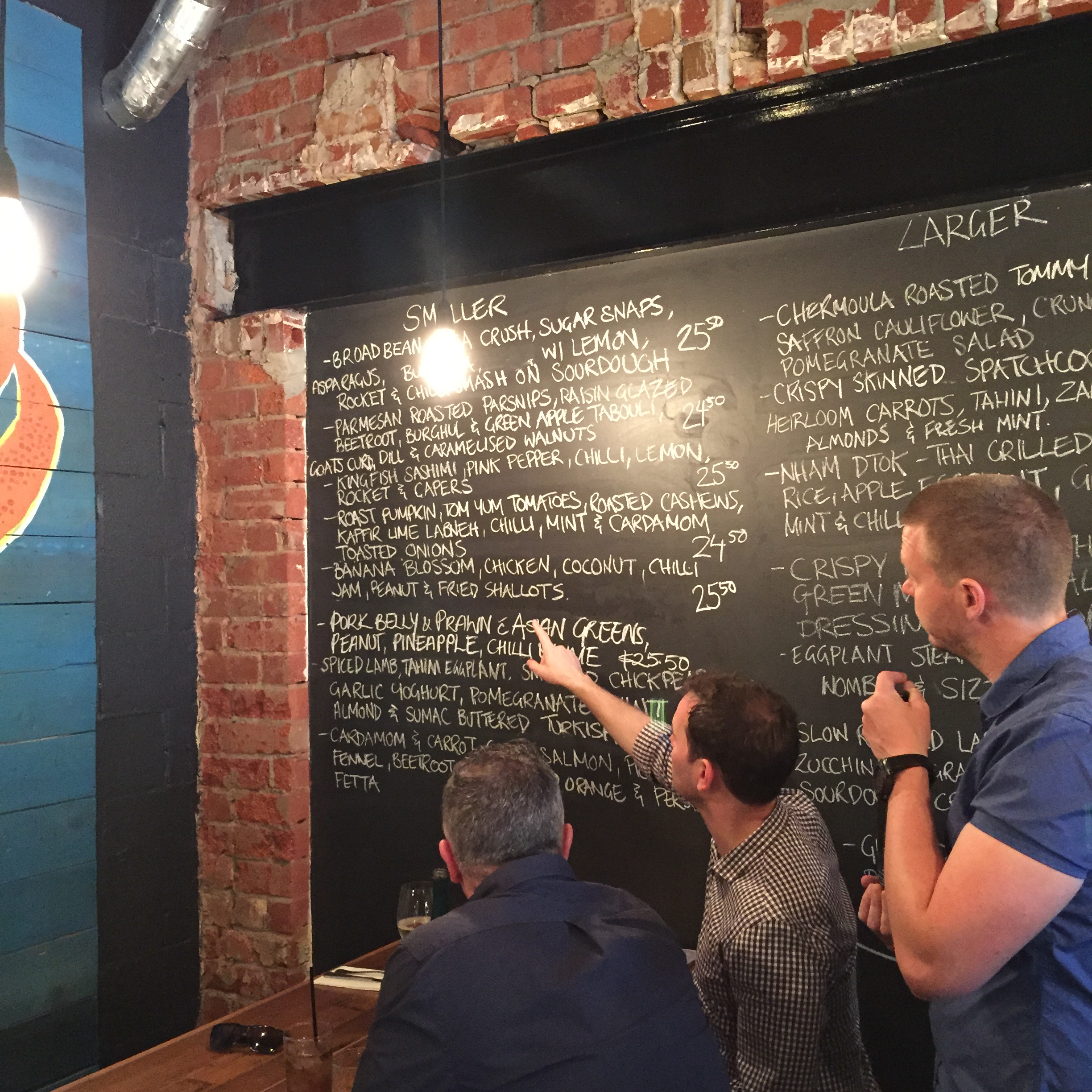Browsing the menu at Peel Street Kitchen