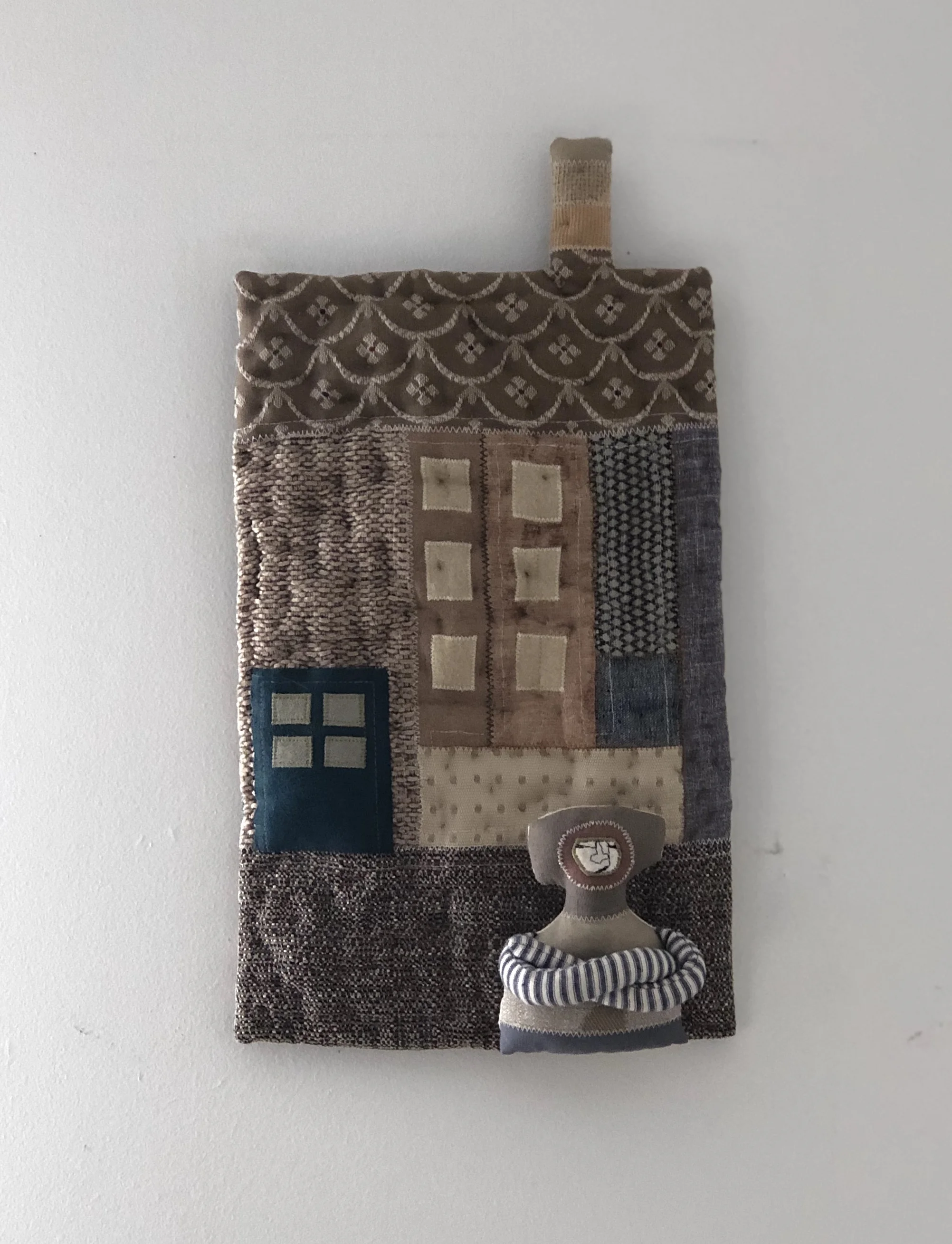 Olivia Parsonage Building with man out the front, soft wall sculpture $250.00