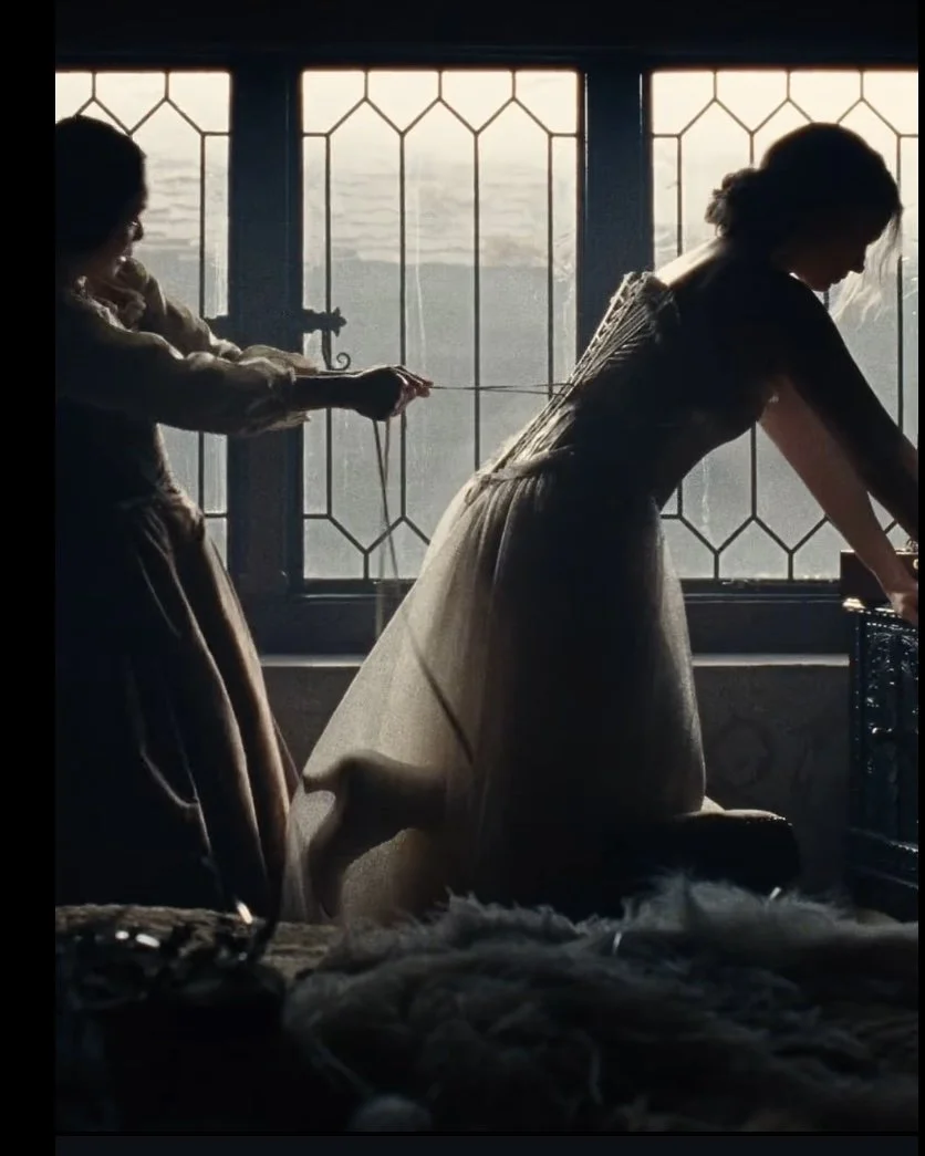 a scene from the film Wuthering Heights in which the wedding corset is tightened