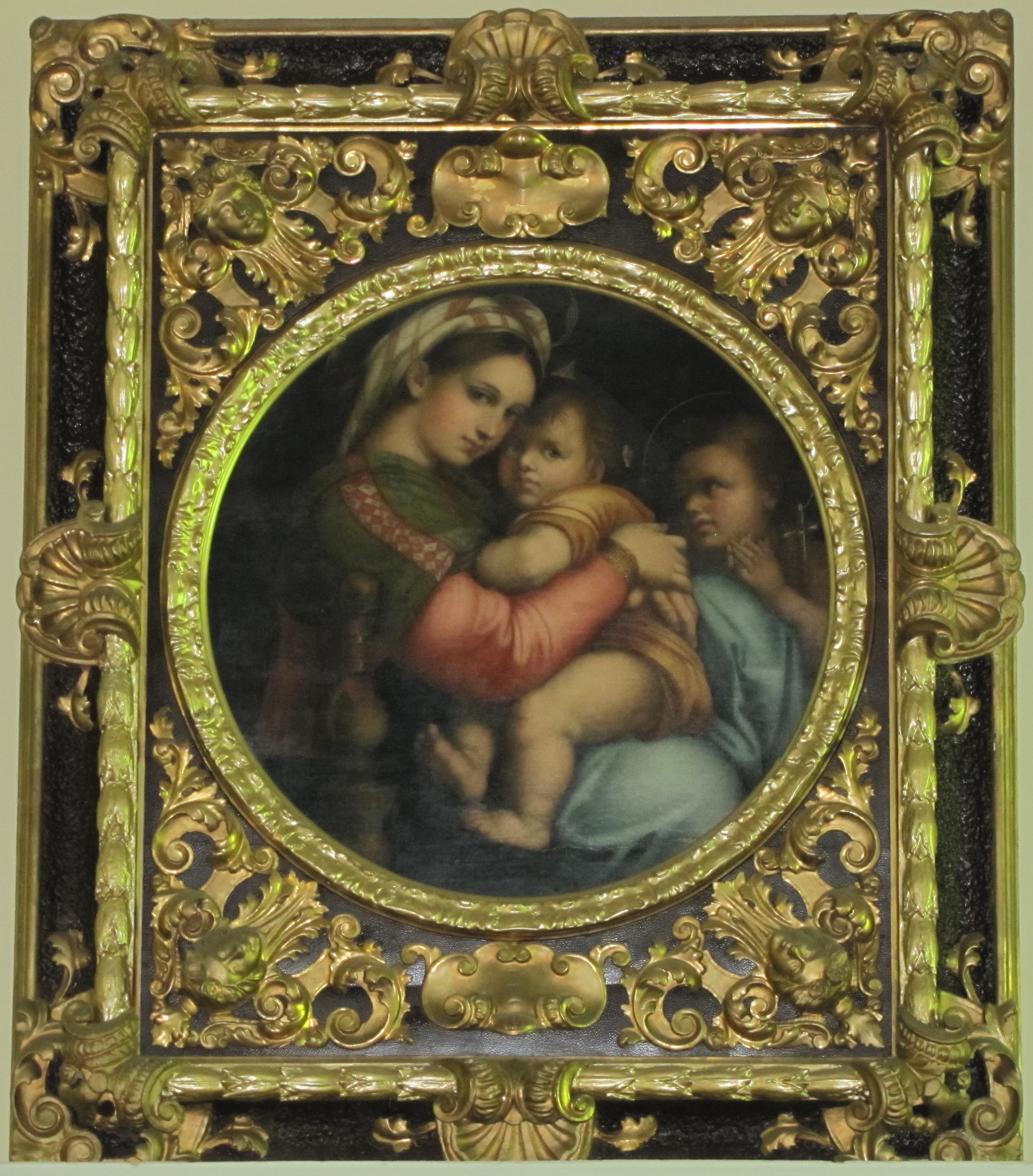 Hanging above the main entrance is this print of the Madonna, MADONNA DELLA SEDIA, taken from the original by Raphael, which hangs in the Pitti Palace in Florence.