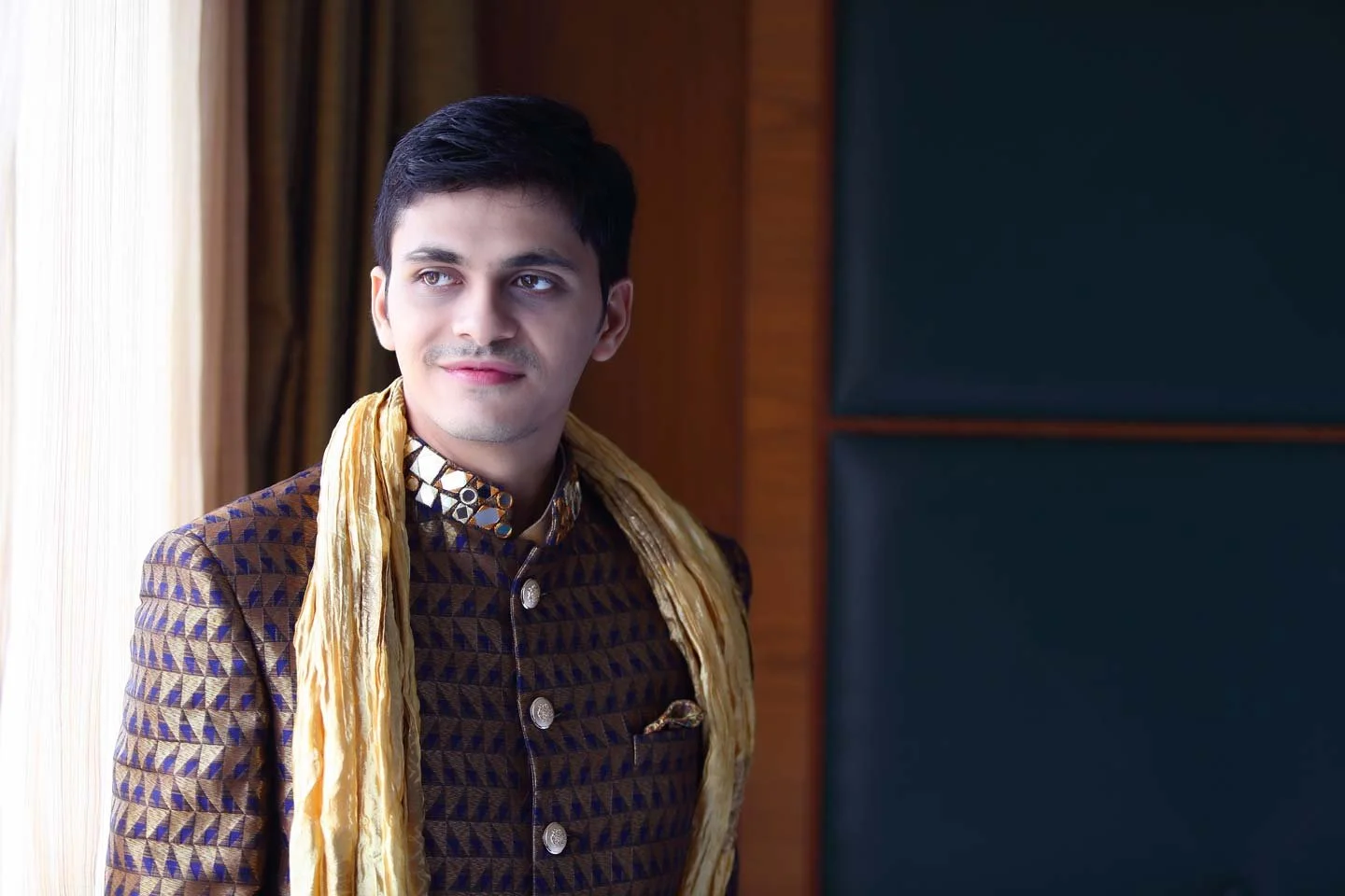 Portrait of Indian Groom near a window