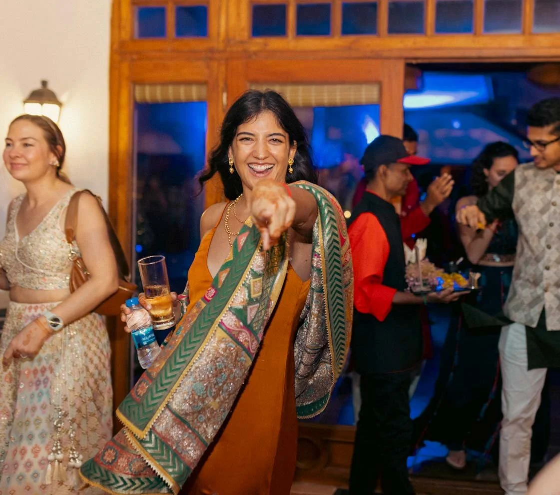 Candid moment of guest enjoying during weddng after party