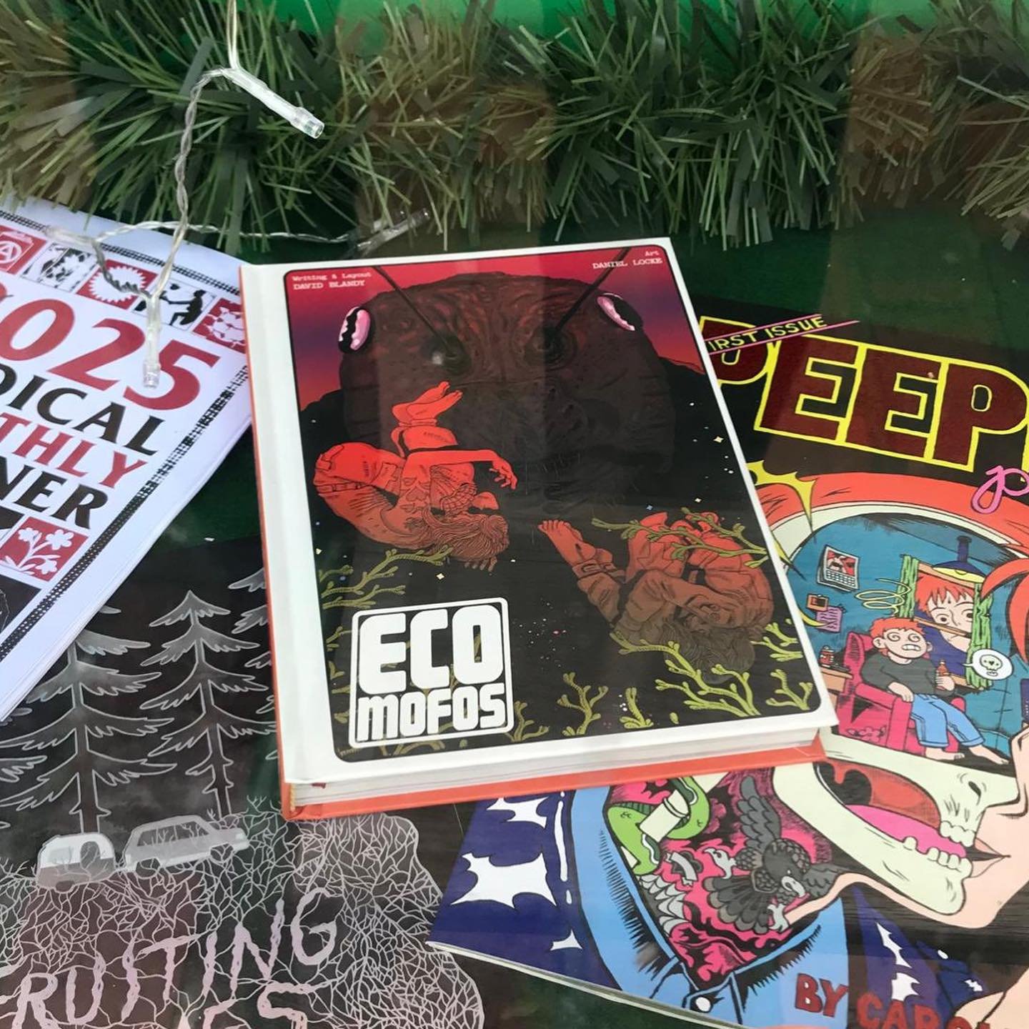 ECOMOFOS!! is now stocked at the coolest shop in the coolest city in the UK. Rush, rush to @familystoreuk now!

It&rsquo;s Xmas time
There&rsquo;s be no need to be afraid. 
At Xmas time we let in indie TTRPGs
And we banish mass produced trade
In this