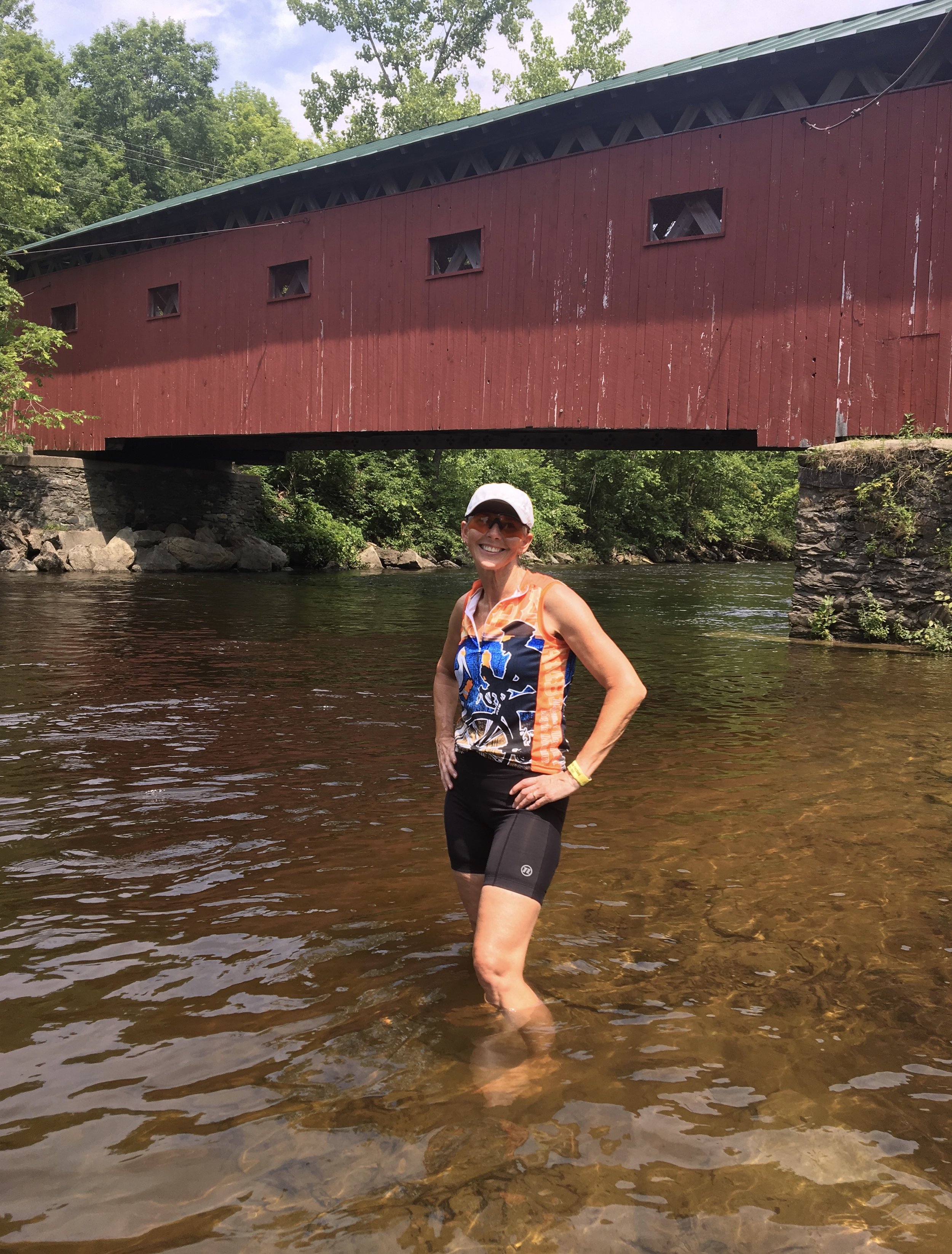 Cooling off in the Battenkill River alongside the Arlington Green Covered Bridge