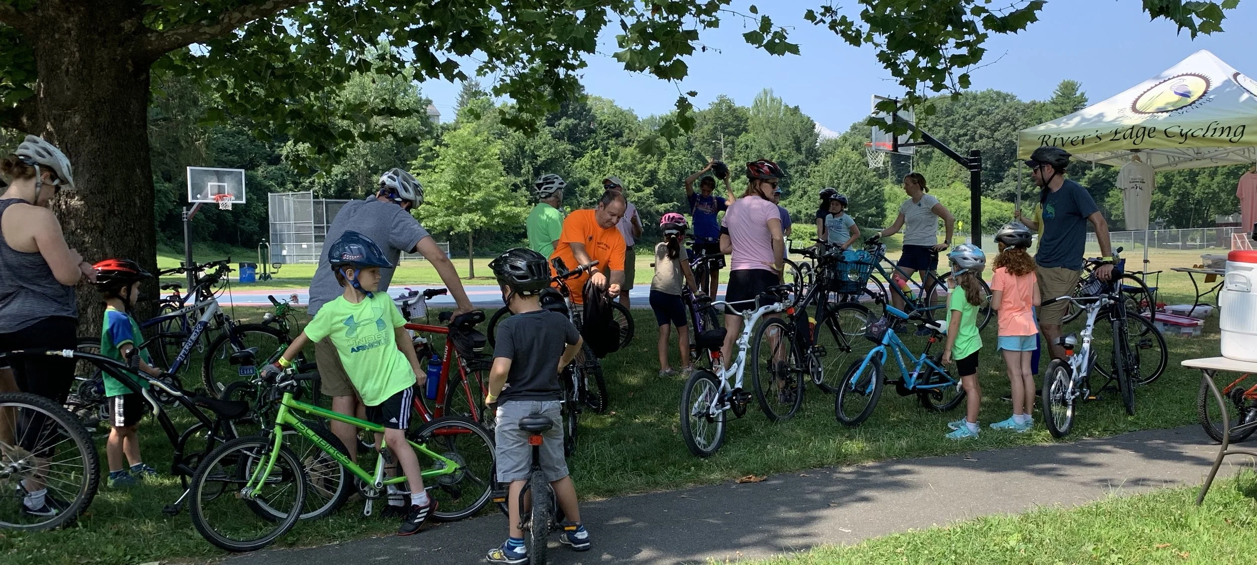 Families prepare to roll on the Kiddie Scoop Loop.