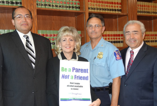 Community leaders working to keep kids off alcohol and other drugs, include, from left, William V. Tucker, Associate Judge, Howard County Circuit Court; Joan Webb Scornaienchi, Executive Director of HC DrugFree and Howard County's Alcohol Coalition Coordinator; Howard County Police Chief Gary Gardner and Howard County State's Attorney Dario Broccolino.