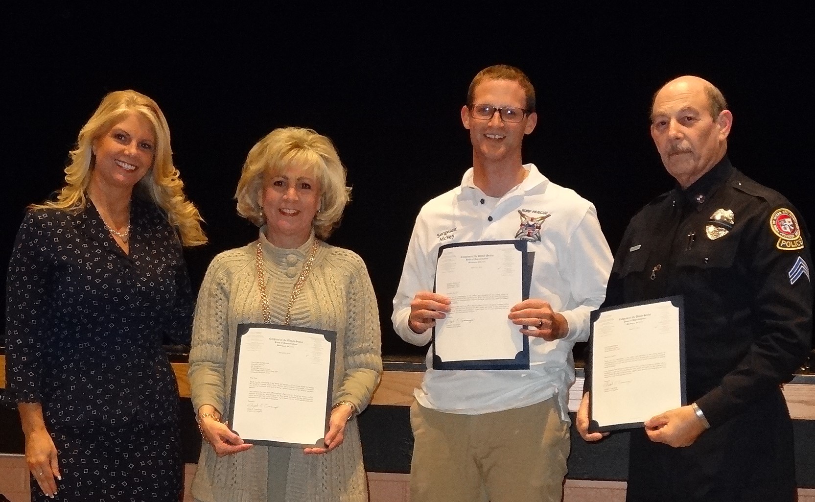 Pictured left to right: Representing Congressman Cummings was Amy Stratton, HC DrugFree's Executive Director Joan Webb Scornaienchi, Ocean City Beach Patrol Sgt. James McVey IV, and Ocean City Police Cpl. Howard Caplan 