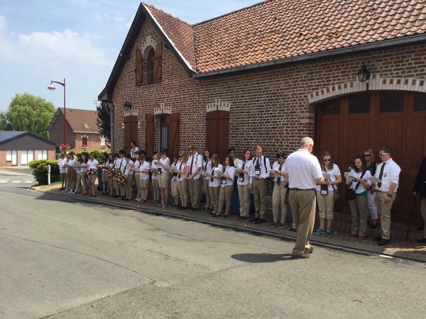Students read the names of those lost at Monchy
