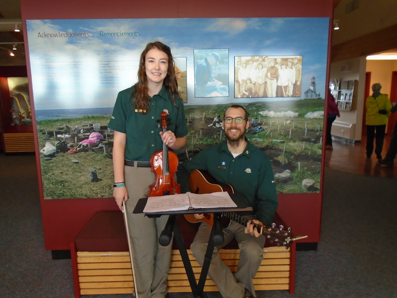 Parks Canada staff providing entertainment at the Port au Choix visitor center during the first day of the festival.