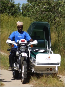 Team leader, Assane Mussa, driving testing the bikes!