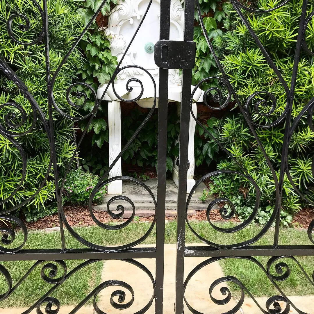 6096. Philip Simmons Iron Gate 3_Charleston GardenWorks.JPG