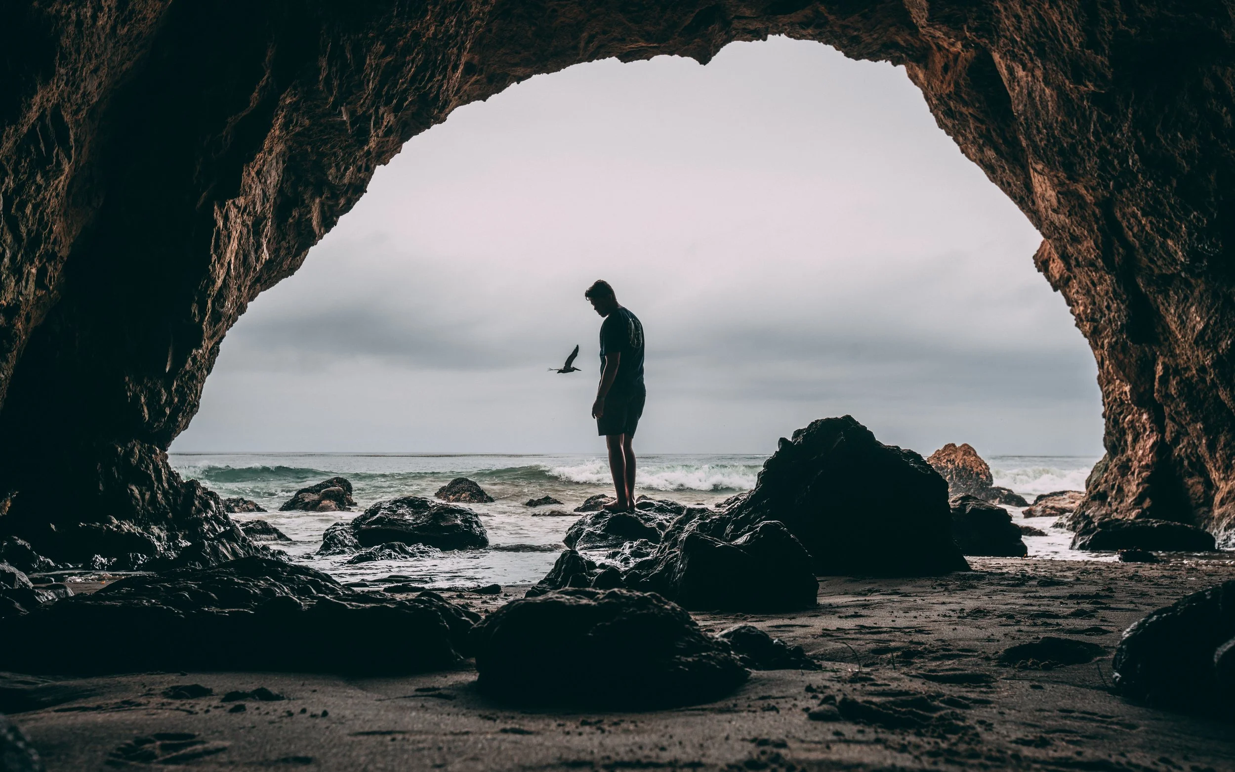 negative-space-man-cave-beach-ocean-vojtech-okenka.jpg