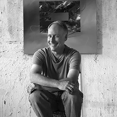 Joel Masewich Joel Masewich is a professional visual artist, working full-time for the past 18 years. He is an abstract painter, working with acrylic on paper or canvas. His multi-layered, imaginary works represent his emotional response to landscapes, and sometimes to events or ideas. Many of his paintings are strongly horizontal and contain visual references to water or light. His vivid colours are sharply contrasting, as if lit by direct sunlight. Art collectors are drawn to the immediate, fresh quality of his work which crosses the boundary between landscape and abstract art. His technique is to layer the paints, then intermix them with palette knives and brushes, leaving a sharp and lively interplay of colour. In a recent exhibition, Passage to Salem, Joel began to include collage elements in his work. This began with paper originals, and now involves stainless steel shapes, which are laser cut and applied to the canvas. This technique is evolving to include glass and paper elements as well. Appropriately, Joel Masewich lives in a rural area, in the hamlet of Salem, which sits on the outskirts of the village of Elora in southwestern Ontario. His home and studio are housed in a renovated stone stable. He is active in the local arts community, but also travels widely to show his work in galleries and exhibitions. He is married, with three children, and is an active, competitive squash player. www.joelmasewich.com