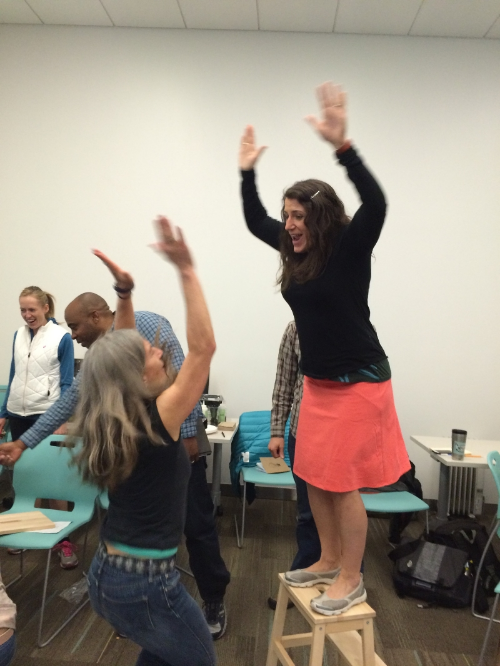BVSD educators celebrate the&nbsp;completion of their stool construction.