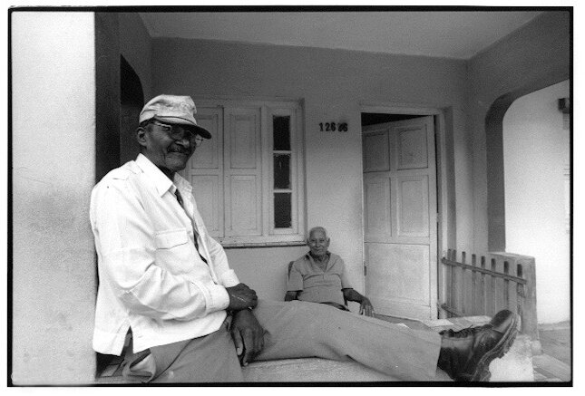 Men on Porch, Mariel, Cuba, 2003