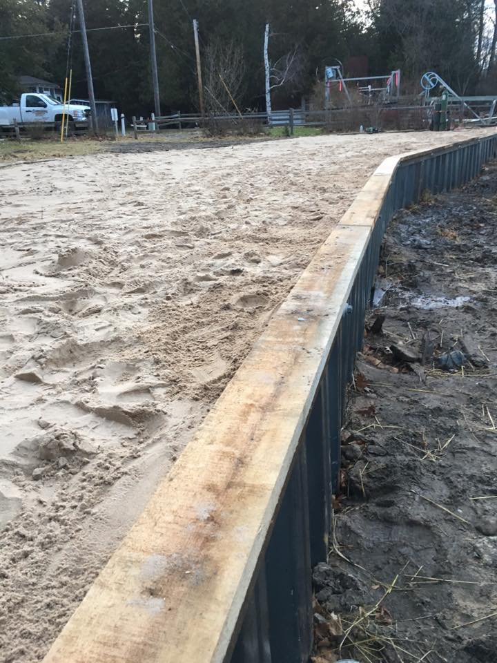  Steel seawall with oak cap on Portage Lake 