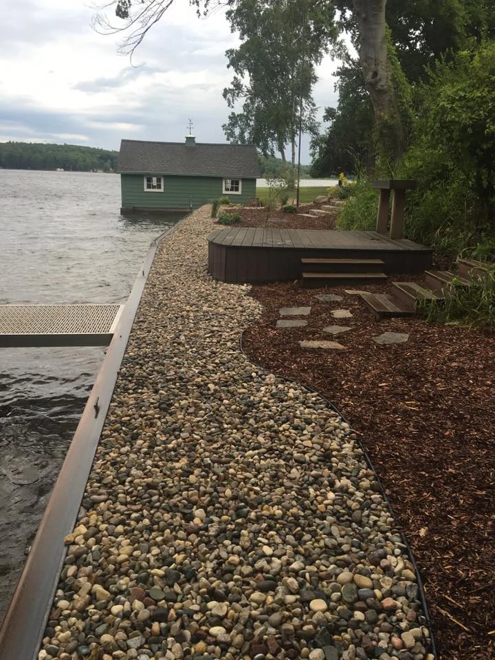 New steel seawall with landscaping on Hamlin Lake