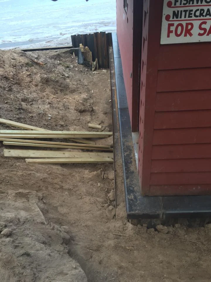 New foundation under existing boathouse on Hamlin Lake