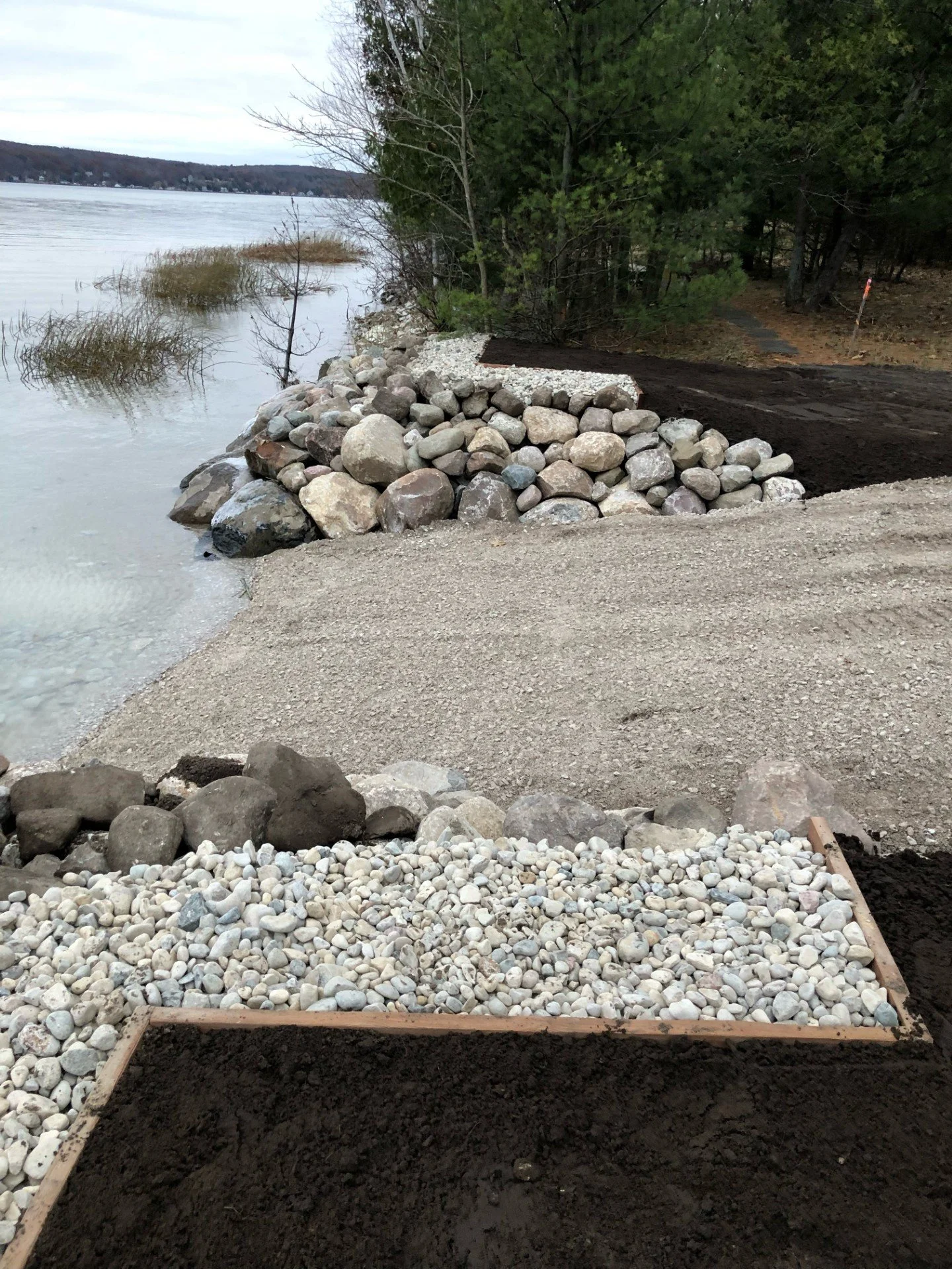  Natural rock shoreline protection with water access 