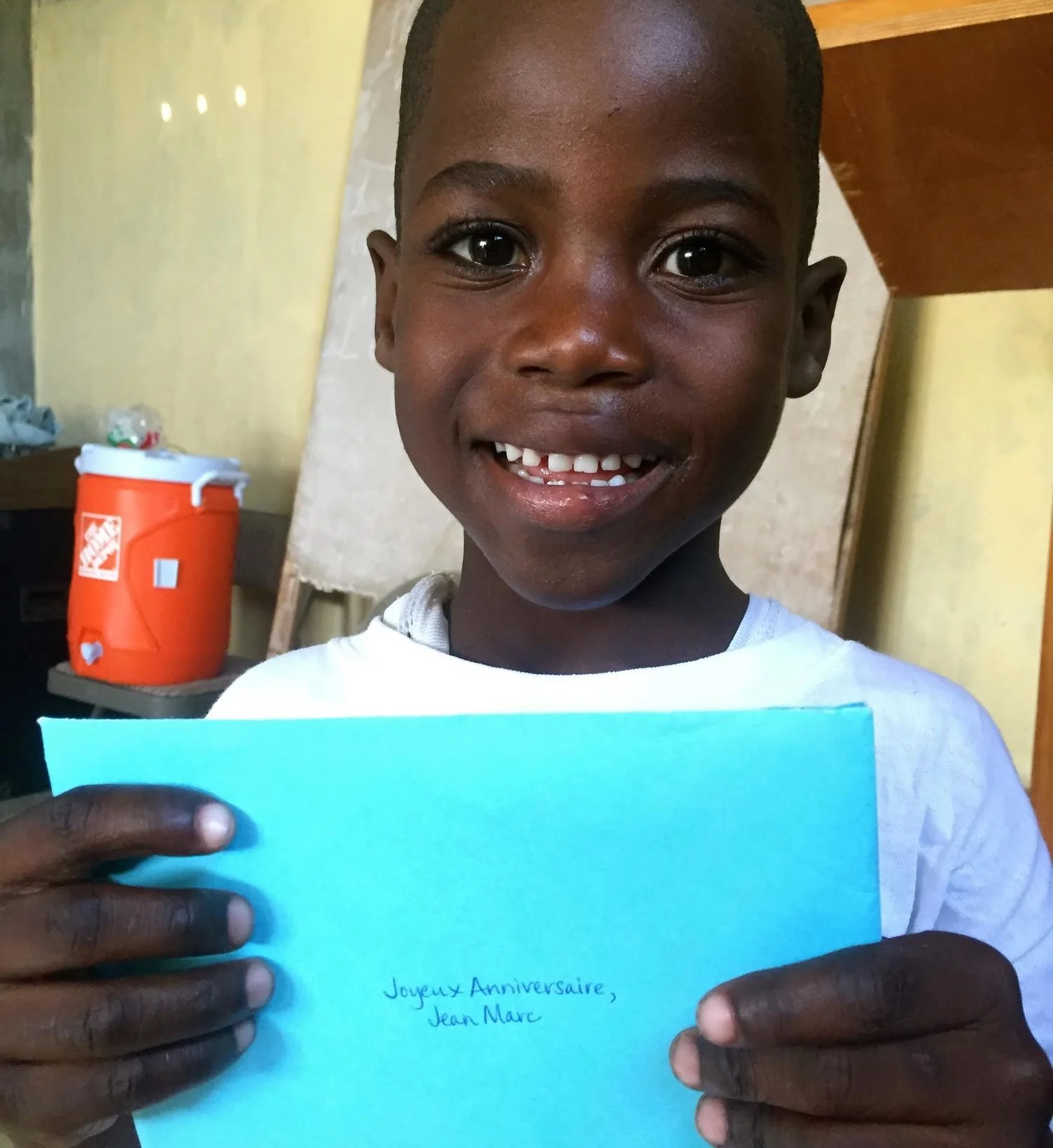 Jean Marc with his letter from his sponsor