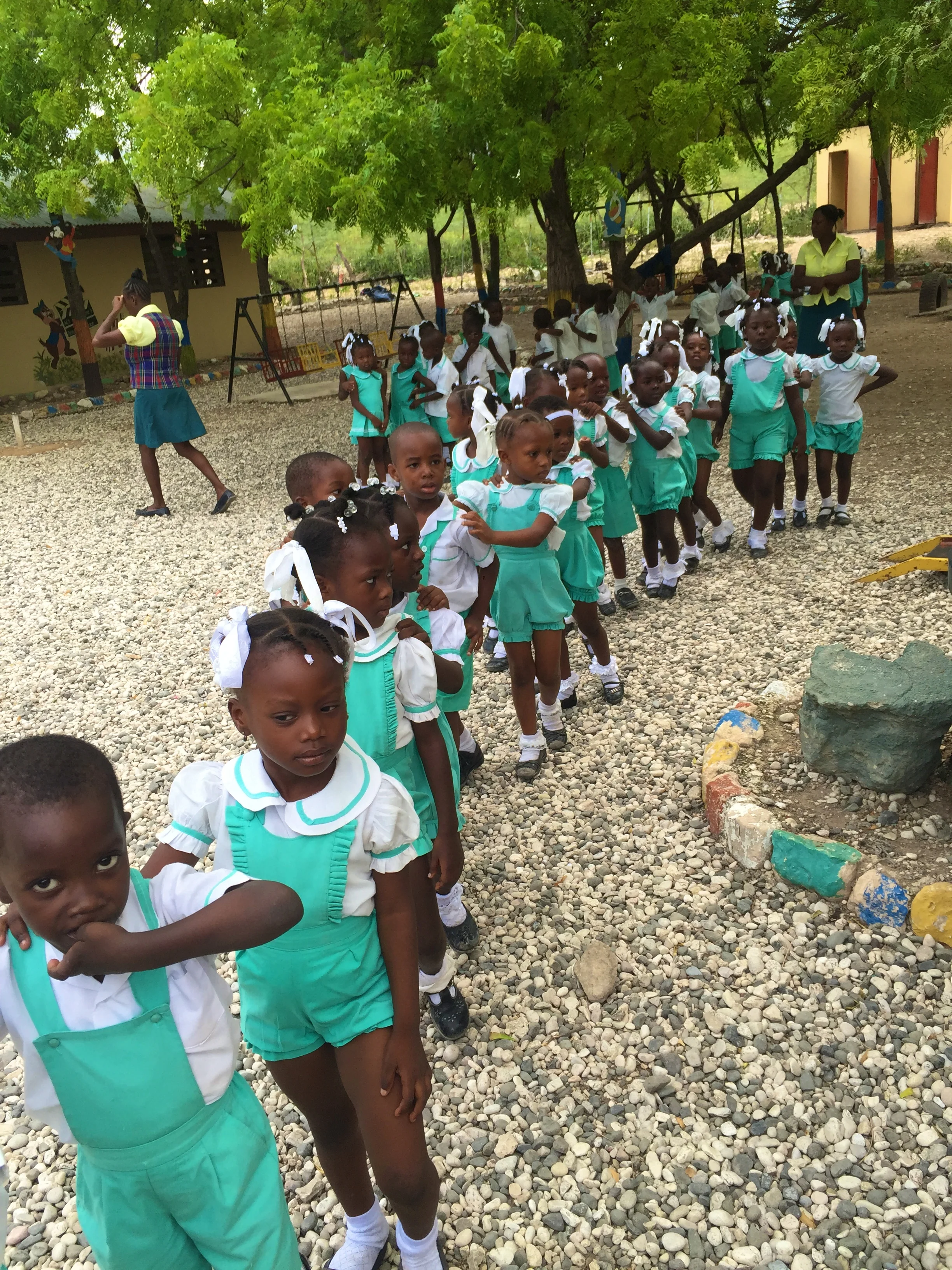All the children lining up to return back to their classrooms to learn!