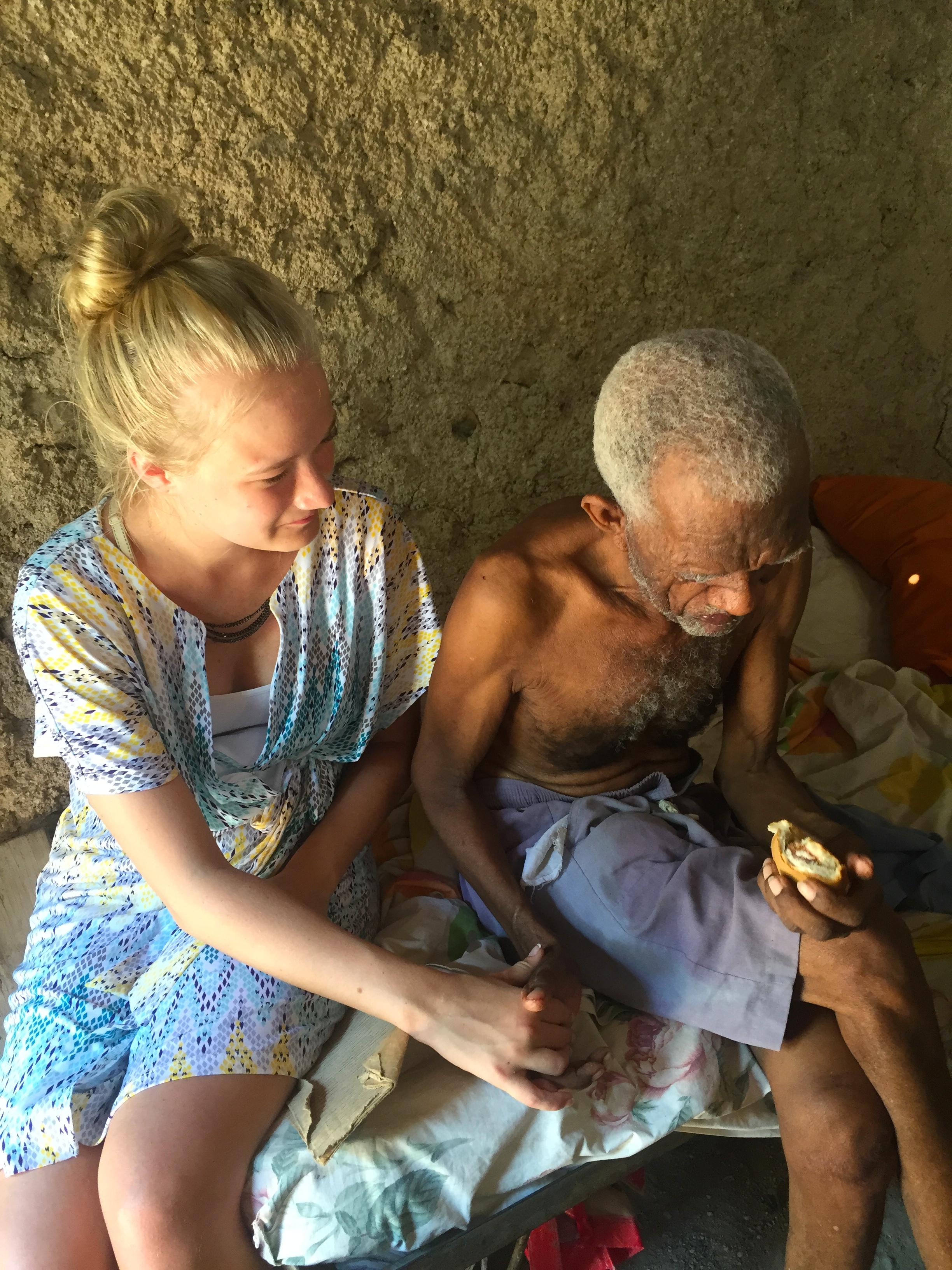 Kenzie and Edmond praying together.